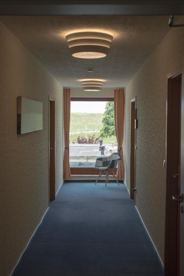 Hotel Am Friesenstrand Tossens Exterior photo